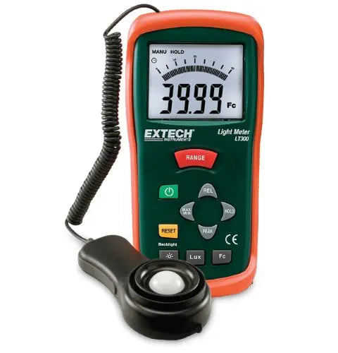 Extech LT300 Light Meter, handheld device with an LCD screen, green and black color scheme, with an attached remote light sensor via a coiled cable.